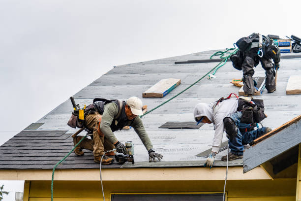 Professional Roofing technician working in Fort Hill, PA